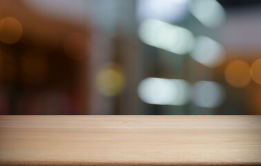 Empty wood table top and blur of out door garden background Empty wooden table space for text marketing promotion. blank wood table copy space for background