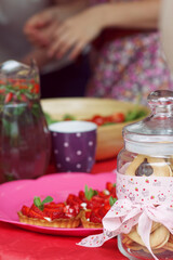 Glass jar with cookies closeup.