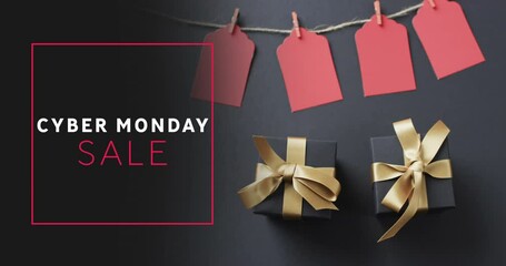 Animation of cyber monday sale text over gift tags and boxes - Powered by Adobe