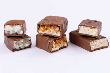 Set of chocolate bars broken into two pieces. Close-up.