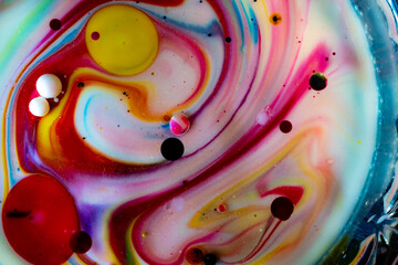 abstract photo of oil paints in oil and milk