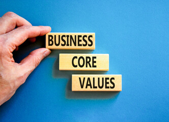 Business core values symbol. Concept words Business core values on wooden block. Beautiful blue...