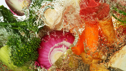 Freeze Motion Shot of Splashing Fresh Vegetable.