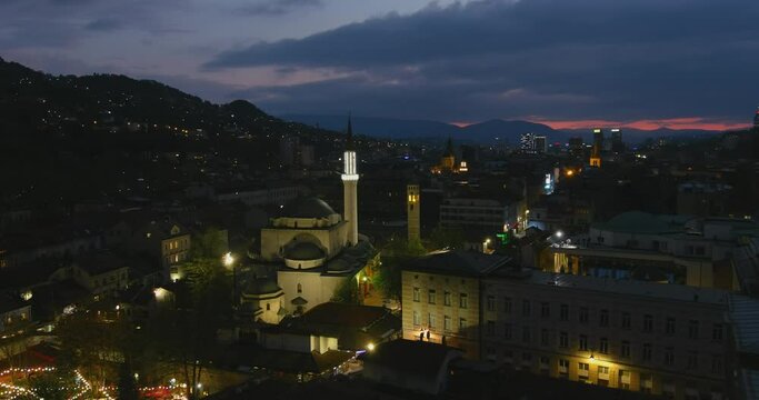Aerial View of Mosque with Orthodox and Catholic Churches in the Background in Sarajevo at Night