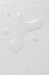 Drops of cosmetic micellar water or tonic. Closeup, macro photography