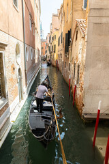 Fototapeta na wymiar Gondelfahrt auf einem Venezianischen Kanal