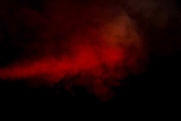 Orange and red steam on a black background.