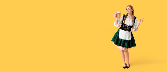 Beautiful Octoberfest waitress with beer on yellow background with space for text