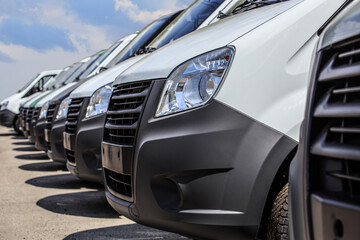 minibuses and vans outside - 634820896