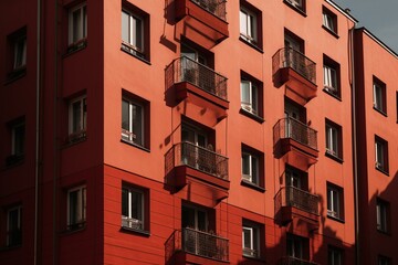 Fototapeta na wymiar Red apartment building. Generative AI