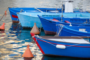 Fototapeta na wymiar Fishing boats in the harbor of Matera, Puglia, Italy