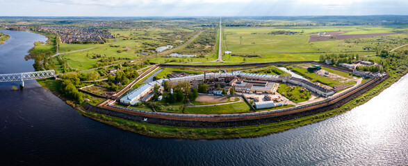 Daugavpils, Latvia - August 13, 2023. Aerial view of Daugavpils prison by the river Daugava....
