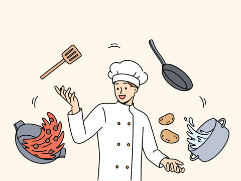Man cook in white uniform and cap stands among flying pots and ingredients for cooking delicious soup. Professional guy cafe cook comes up with recipe for new dish for restaurant menu