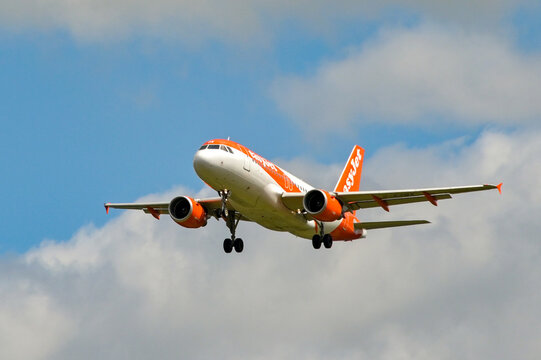 London, England, UK - 1 August 2023: Airbus A319 operated by budget airline easyjet coming into land at London Gatwick airport.