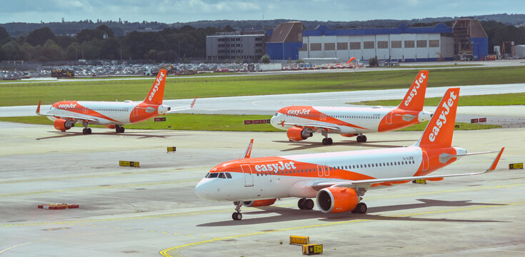 London, England, UK - 1 August 2023: Panoramic view of passenger planes operated by budget airline easyjet at London Gatwick airport