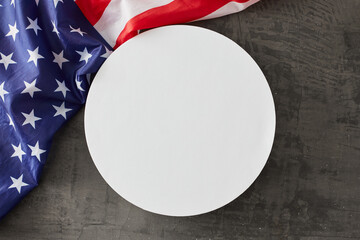 Embracing the festive Labor Day patriotism. Top view photo of american national flag on concrete...