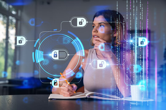 Smiling woman in casual wear taking notes in notebook at office workplace with coffee cup. Concept of distant business education, information technology, dreaming, thinking. Blockchain drawings