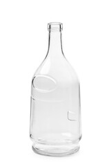 An empty bottle of an unusual shape made of transparent glass for cognac, whiskey on a white background.