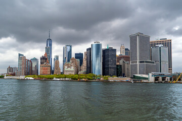New York City skyline taken from the Hudson River on a stormy day.