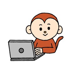 パソコン作業をするサル
