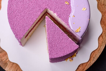 Delicious fresh sweet mousse cake with berry filling
