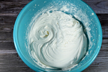 Whipped cream, a heavy, double cream, or other high-fat cream, that is whipped by a whisk or mixer...