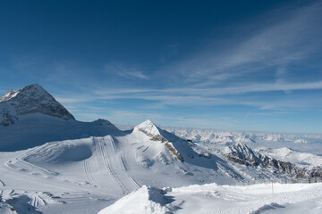 Hintertux glacier panorama on a sunny winter day. Snowy background panorama, white winter scenery.