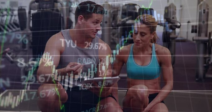 Animation of financial data procesisng over diverse male trainer discussing with fit woman at gym
