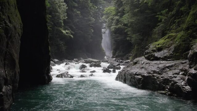 Waterfall and river in the mountain in Odaicho, Mie Japan by drone