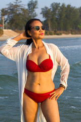 Woman body pretty with red  bikini on beach