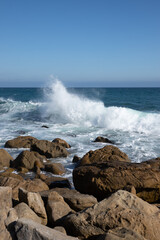 waves crashing on rocks