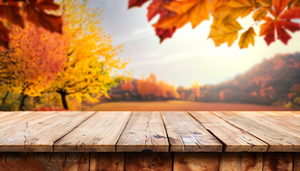 Naklejka na ściany i meble wooden table in front of a colorful autumn landscape, beautiful autumn background concept with fall leaves and advertising space