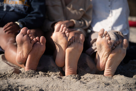feet on the beach