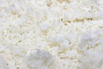 white rice background. white rice texture. close up of rice. rice with selective focus.
