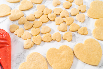 Heart-shaped sugar cookies with royal icing
