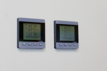 LCD digital AC voltmeters on a control panel