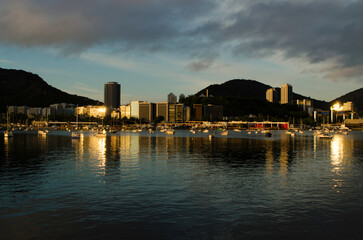 Skyline of Botafogo District Reflected on Water During Sunrise in Rio de Janeiro City
