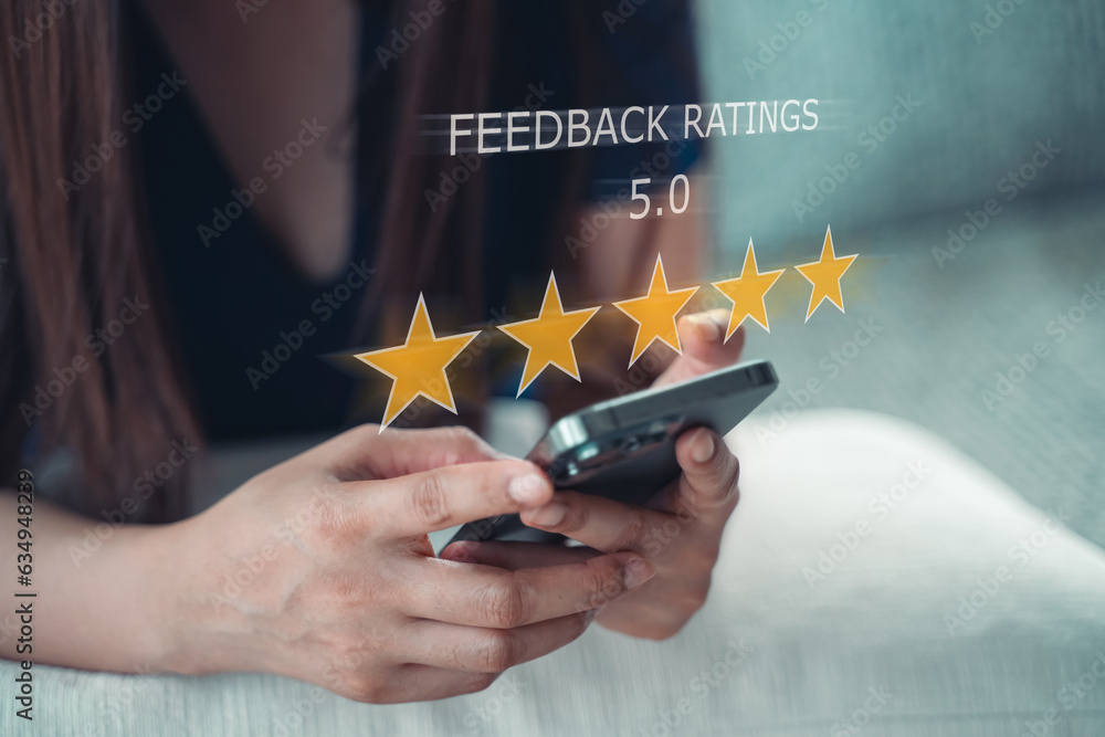 Poster customer review good rating concept, hand using smartphone with popup o five star icon on visual scr