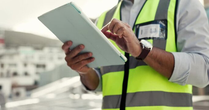 Man, technician and hands on tablet in city for solar panel installation, electrical maintenance or inspection on rooftop. Closeup of person or engineer working on technology for renewable energy
