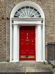A famous red painted Georgian door in Dublin, Ireland