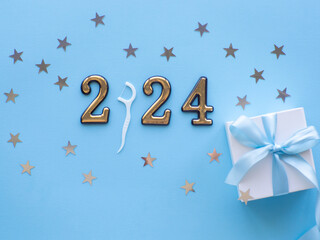 2024 and dental concept. Close up view photo with 2024 and white dental floss stick instead zero on...