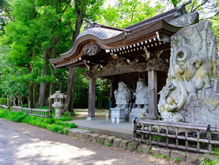 Japanese guardian statues at the traditional street in Tokyo wide shot