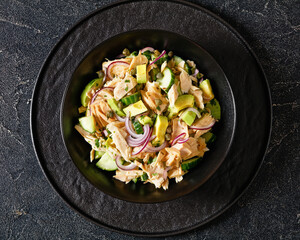 tuna salad with avocado, onion, cucumber, capers