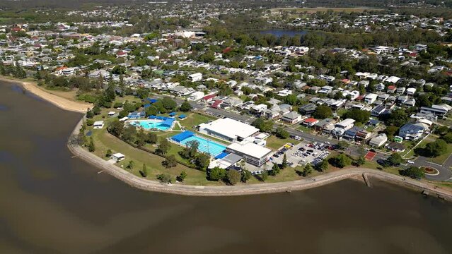 Aerial view of Sandgate pool and Brighton waterfront on a sunny day, Brisbane, Queensland, Australia