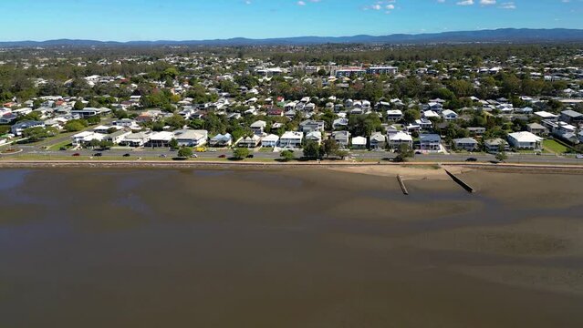 Aerial view rising shot of Sandgate and Brighton waterfront on a sunny day, Brisbane, Queensland, Australia