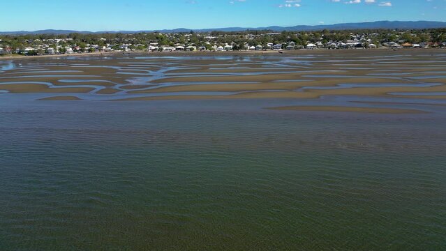 Aerial view of Sandgate and Brighton waterfront and ocean on a sunny day, Brisbane, Queensland, Australia