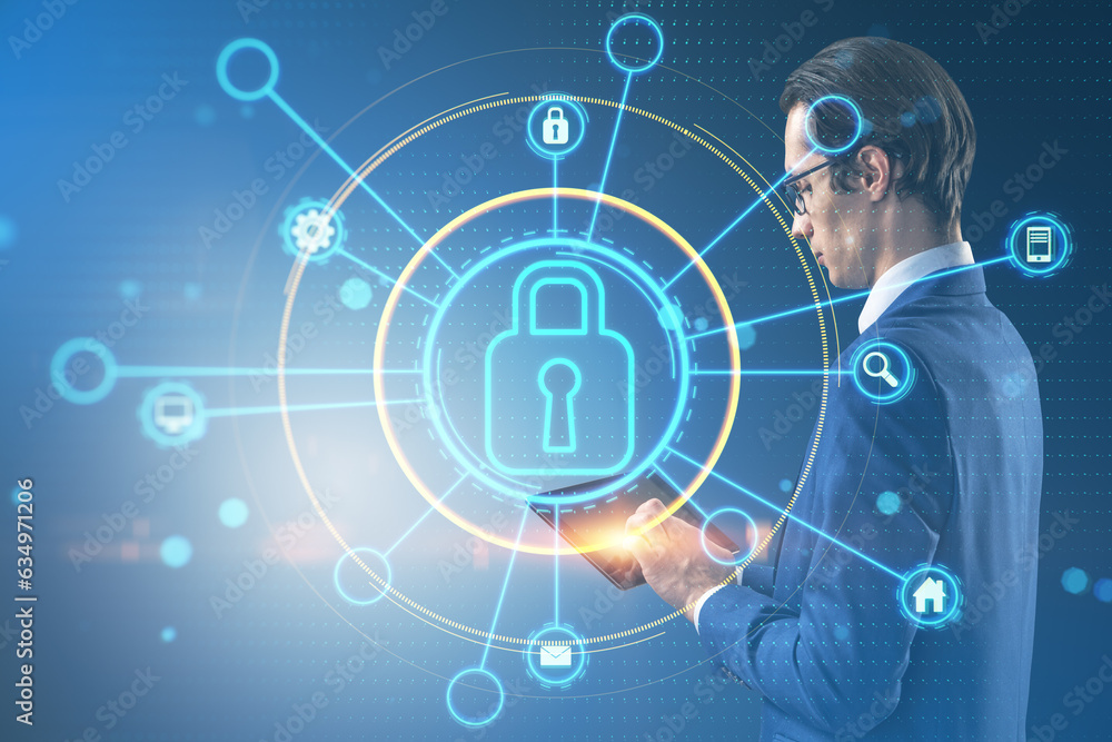 Poster attractive young businessman using tablet with glowing padlock screen hologram on blurry background.