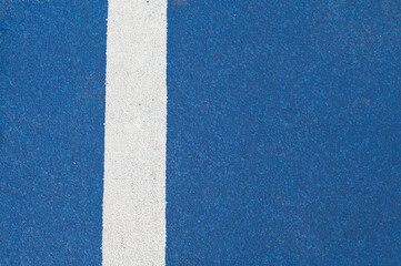 Blue running track background and texture.