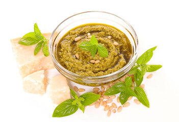 pesto sauce with fresh ingredients on white background
