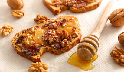 grilled bread toast with goat cheese, walnut and honey